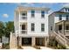 Charming two-story coastal home with a covered porch, brick foundation and ample parking at 3105 Vanessa Lynne, Johns Island, SC 29455