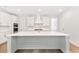 Bright, modern kitchen with a large island, white cabinetry, and stainless steel appliances at 3105 Vanessa Lynne, Johns Island, SC 29455