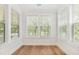 Inviting sunroom bathed in natural light from multiple windows with hardwood floors at 3105 Vanessa Lynne, Johns Island, SC 29455