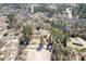 Aerial view of a home in a wooded area, showing the surrounding trees and neighborhood at 328 Fox Field Rd, Walterboro, SC 29488