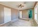 Bedroom with an attached bath and multiple windows, ready for personalized updates at 328 Fox Field Rd, Walterboro, SC 29488