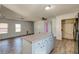 Bright, open-concept kitchen featuring updated appliances, an island, and light blue walls at 328 Fox Field Rd, Walterboro, SC 29488