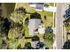 Aerial view showcases the home's roof, driveway, and surrounding landscape, highlighting its position in the neighborhood at 329 Carriage Wheel Rd, Moncks Corner, SC 29461