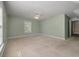 Spacious bedroom with a ceiling fan, carpet and a large window overlooking a yard at 329 Carriage Wheel Rd, Moncks Corner, SC 29461