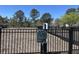 Dog park rules sign posted on fence of a community dog park, a great space for furry friends at 329 Carriage Wheel Rd, Moncks Corner, SC 29461