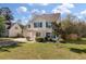 Attractive home featuring a well-manicured front lawn and blue shutters at 329 Carriage Wheel Rd, Moncks Corner, SC 29461