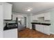 Modern kitchen with stainless steel appliances, granite countertops, and white cabinets at 329 Carriage Wheel Rd, Moncks Corner, SC 29461