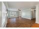 Open living area with fireplace, tile floors, and natural light at 329 Carriage Wheel Rd, Moncks Corner, SC 29461