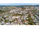 Expansive aerial view of a neighborhood featuring lush trees, varied architecture, and distant bridges at 382 Race St # A, Charleston, SC 29403