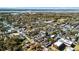 A bird's eye view showing the property nestled among tree-lined streets and nearby community buildings at 382 Race St # A, Charleston, SC 29403
