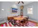 Charming dining room with stylish furnishings, a unique rug, and ample natural light at 382 Race St # A, Charleston, SC 29403