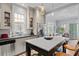 Bright kitchen featuring an island with counter seating, stainless steel appliances, and an open concept design at 382 Race St # A, Charleston, SC 29403