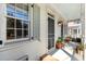 Charming porch with lantern lighting and views of the surrounding neighborhood at 382 Race St # A, Charleston, SC 29403