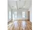 Spacious bedroom with vaulted ceilings, bright windows, and beautiful hardwood floors at 3889 Summerton St, Mount Pleasant, SC 29466