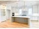 Bright kitchen featuring a large island, stainless steel appliances, and ample cabinet space for storage at 3889 Summerton St, Mount Pleasant, SC 29466