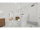 This bathroom features dual vanities, marble floors, an open shower, and ample natural light at 3893 Summerton St, Mount Pleasant, SC 29466