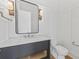 Modern bathroom with a sleek vanity, large mirror, elegant lighting, and contemporary fixtures at 3893 Summerton St, Mount Pleasant, SC 29466