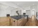 Spacious open kitchen area with an island, stainless steel appliances, and view of the living area at 3893 Summerton St, Mount Pleasant, SC 29466