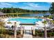 Resort-style pool at the Lake Club featuring a large pool, sun loungers, and a lake view at 3893 Summerton St, Mount Pleasant, SC 29466