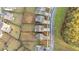 Aerial view of the neighborhood with tree-lined streets and houses at 462 Fox Sparrow Ct, Summerville, SC 29486