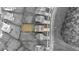 Aerial view of a suburban home featuring a well-maintained lawn and a concrete driveway on a neatly planned street at 462 Fox Sparrow Ct, Summerville, SC 29486