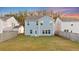 Fenced backyard with blue siding and grass lawn at 462 Fox Sparrow Ct, Summerville, SC 29486