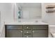 Bathroom featuring a double vanity with granite countertops and two sinks, enhancing convenience and style at 462 Fox Sparrow Ct, Summerville, SC 29486
