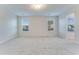 Bright bedroom featuring plush carpet and natural light, creating a flexible living area at 462 Fox Sparrow Ct, Summerville, SC 29486