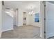 Bright dining room with a modern chandelier and wood-look flooring at 462 Fox Sparrow Ct, Summerville, SC 29486