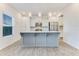 Open kitchen featuring a gray island with modern pendant lighting at 462 Fox Sparrow Ct, Summerville, SC 29486