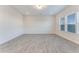 Bright living room featuring recessed lighting and stylish flooring and large windows that offer ample natural light at 462 Fox Sparrow Ct, Summerville, SC 29486