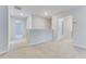 Bright loft space featuring plush carpet and neutral walls, creating a flexible living area at 462 Fox Sparrow Ct, Summerville, SC 29486