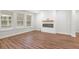 Bright living room with a modern fireplace and large windows at 468 Cadbury Loop, Summerville, SC 29486