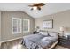 Inviting bedroom filled with natural light from large windows, and complete with luxury vinyl floors at 4852 Rocking Porch Ln, Summerville, SC 29485