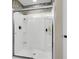 Modern shower with decorative tile detail and built-in shelves at 4852 Rocking Porch Ln, Summerville, SC 29485