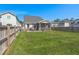Large backyard featuring a patio and plenty of green space for outdoor activities at 546 Alderly Dr, Moncks Corner, SC 29461