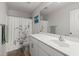Functional bathroom with a vanity, large mirror, and floral shower curtain at 546 Alderly Dr, Moncks Corner, SC 29461