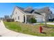 Beautiful single-Gathering home with a manicured lawn and charming front porch at 546 Alderly Dr, Moncks Corner, SC 29461