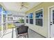 Relaxing screened patio with a ceiling fan and comfortable seating, perfect for enjoying the outdoors at 587 Crossland Dr, Moncks Corner, SC 29461