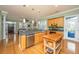 Well-equipped kitchen with a sink, stainless steel appliances, and an island for food preparation at 6035 Grand Council St, Daniel Island, SC 29492