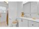 Bright, clean bathroom with white vanity, tiled floors, and neutral decor at 679 Kent St, Mount Pleasant, SC 29464
