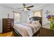 Comfortable bedroom with a queen bed, natural light from windows, and neutral décor at 679 Kent St, Mount Pleasant, SC 29464