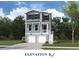 Charming two-story home with light blue siding, black shutters, and a two-car garage at 750 Minton Rd, Charleston, SC 29412