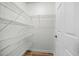 Walk in closet featuring wire shelving and vinyl floors at 9080 Delancey Cir, North Charleston, SC 29406