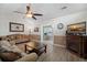 Open-concept living room with fireplace and comfortable seating, perfect for relaxation and entertainment at 9080 Delancey Cir, North Charleston, SC 29406