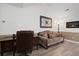 Comfortable living room with a couch, desk, and stylish decor creating a welcoming space at 9080 Delancey Cir, North Charleston, SC 29406