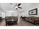 Expansive living area with multiple seating arrangements and stylish decor, ideal for gatherings at 9080 Delancey Cir, North Charleston, SC 29406