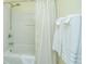 Bright bathroom features a shower and tub combo with white towels at 9408 Harroway Rd, Summerville, SC 29485