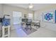 Well-lit room features a desk with dual monitors and an adjacent aquarium at 9408 Harroway Rd, Summerville, SC 29485