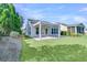 This home features a beautifully maintained lawn at 102 Harbor Point Ct, Summerville, SC 29486